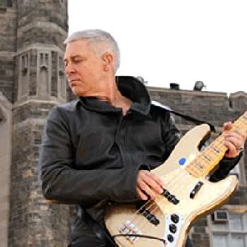 Adam Clayton Biography