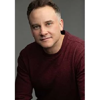 Adam Thomas Biography