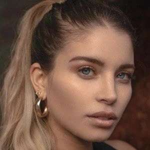 Flavia Laos Biography