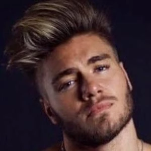 Gus Caleb Smyrnios Biography
