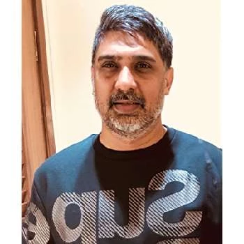 Tinu Suresh Desai Biography