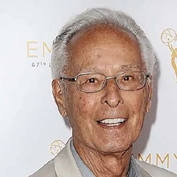 Tony Charmoli Biography