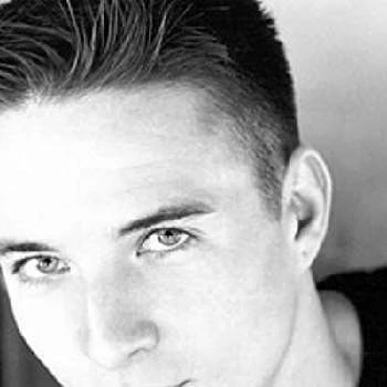 Travis Aaron Wade Biography